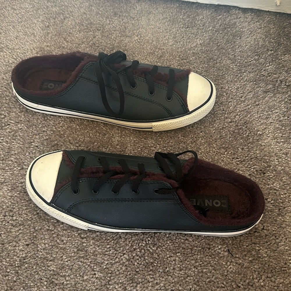 Women’s black with burgundy faux fur lining, Converse All-Star mules.